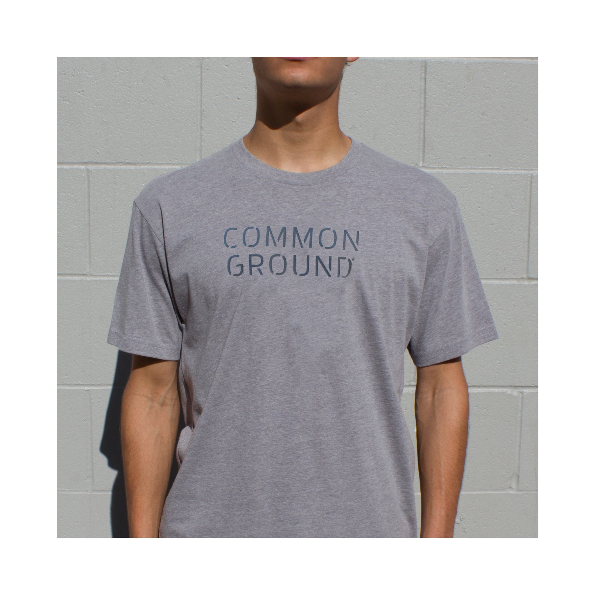 Dark_Heather_Gray - Common Ground T shirt Front on Model